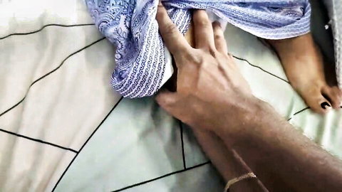 Mallu woman in blue saree has skirt lifted by hand exposing thigh on bed