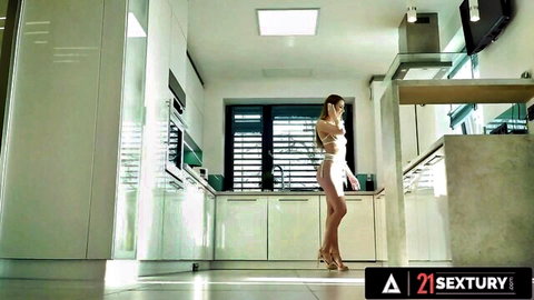 Alexis Crystal in revealing white lingerie and heels in kitchen tease