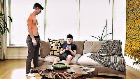 Ricky Vez towers over shirtless Devin Franco in teasing gay pose