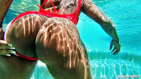 Wet ebony big ass in red bikini underwater, hand grabbing, We Live Together