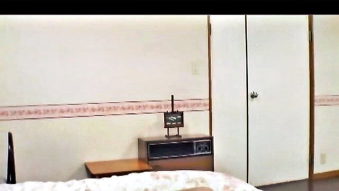 Asian wife pleasuring herself nude in bed, surprise voyeur view