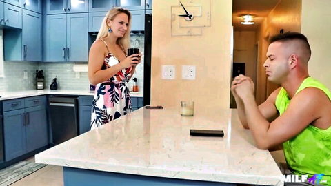 Blonde Sadie in low-cut dress teases man in kitchen before hot sex