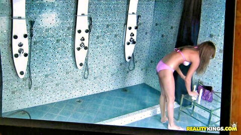 Jessica Lux in pink bikini bending over in steamy shower room