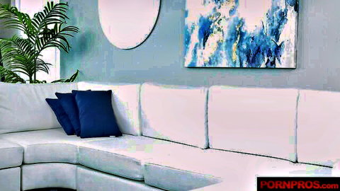 Venice Rose in stylish living room on plush couch, teasing pose