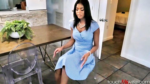 Curvy ebony wife in polka-dot blue dress teases with big tits cleavage and thick thighs