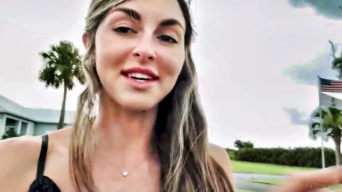Blonde stunner Bryce Adams sneaks out in black top smiling outdoors