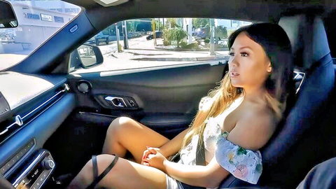 Curvy Asian Phoebe Kalib in floral off-shoulder dress and stockings, seductive car pose