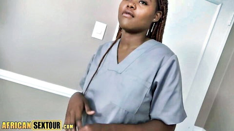 African nurse in blue scrubs posing seductively