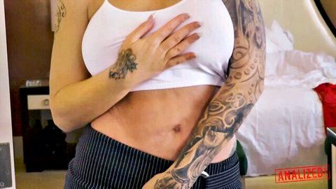 Ryan Conner tattoos and curves in tight white top tease