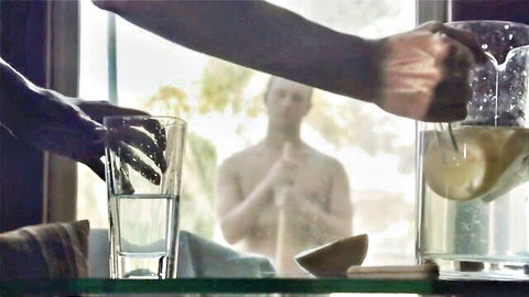 India Summer pouring drink in kitchen seducing nude stepson
