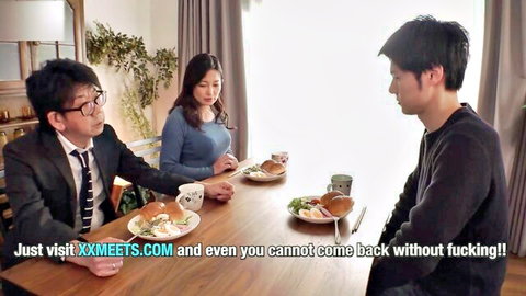 Asian stepmom in blue top at family dinner with stepson and husband, black stockings tease