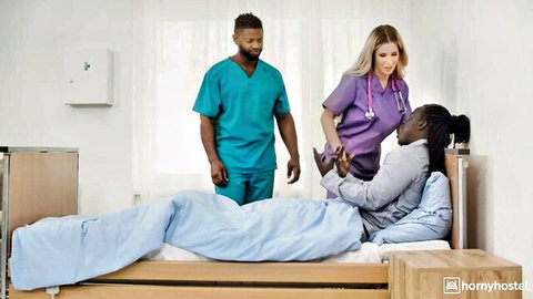 Ema Karter as naughty nurse with ebony patients in hospital bed