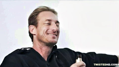 Blond DILF smiling seductively in black hoodie on white background