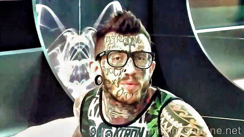 Tattooed Andre Ferraz in glasses and tank top, amateur gay hookup tease