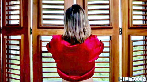 Serenity's bare ass in red silky top, gazing out shutters on secret vacation