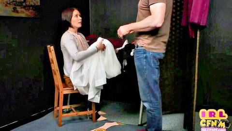 CFNM MILF in stockings sits and teases unzipped man for kinky handjob