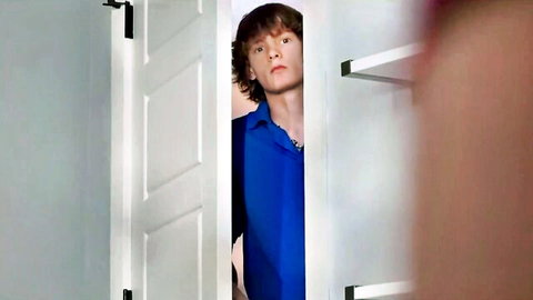 Young man with curly hair peeks through door at hot stepsis, irresistible taboo desire