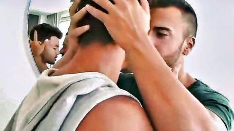 Adriano Carrasco and Tony Rivera passionately kissing in uniform gay scene