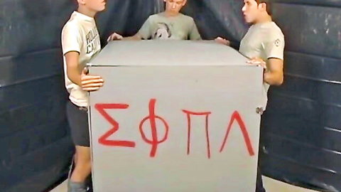 Nevin Scott newbie lifted by frat brothers in initiation box scene