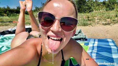 Baebaezoe on beach, tongue out with cum after deepthroat, big tits exposed