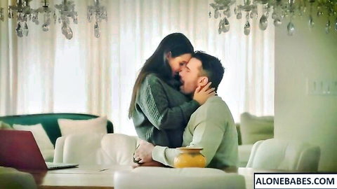 Angela White in passionate lesbian kiss with Te Esperé, steamy embrace