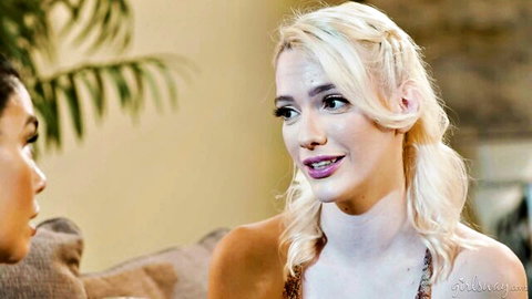 Blonde with pigtails and Asian beauty in low-cut tops showing deep cleavage flirting intimately