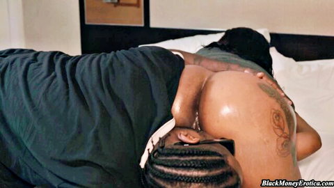 Ebony babe's massive juicy ass gripped by black stud in doggy style position