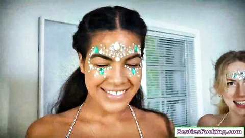 Kelly Aleman and blonde BFF smiling with glittery makeup