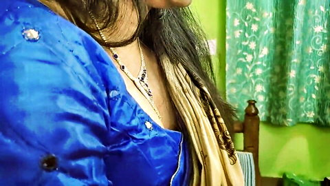 Sharun Raj in sexy blue half saree, cleavage tease