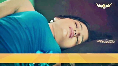 Jadui Palang curvy Indian beauty in low-cut blue dress, seductive sleep pose