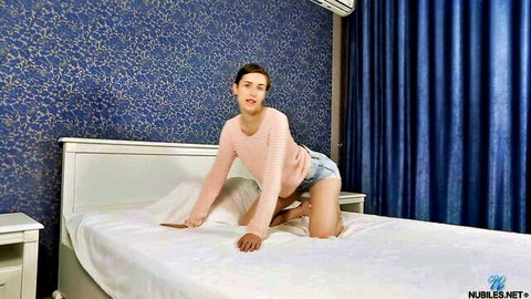 Kinky brunette in sweater and shorts teases in solo cam session