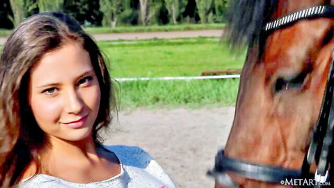 Oretha Mars smiles with horse outdoors, MetArt