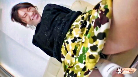Petite Asian babe hikes up yellow skirt exposing wet pussy solo tease