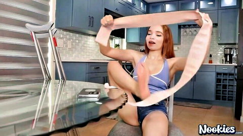 Selina Imai redhead spreading legs wide in teasing pose