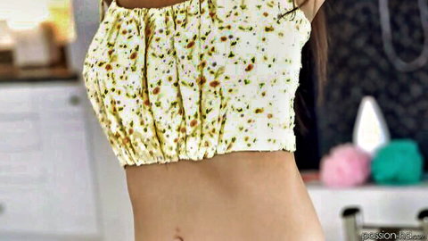 Brunette babe in sheer floral crop top teases underboob and toned abs in bathroom