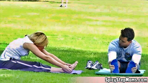 Flexible blonde with sporty ass stretches in yoga pants outdoors before blowjob fun