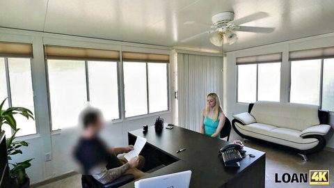 Blonde Allie in teal dress at office desk for loan sex payout