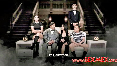 Sexy Latina MILFs in Wednesday Addams cosplay tease Halloween orgy with suited men