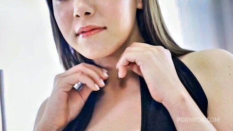 Kitty Kate blonde Asian beauty in black top close-up tease