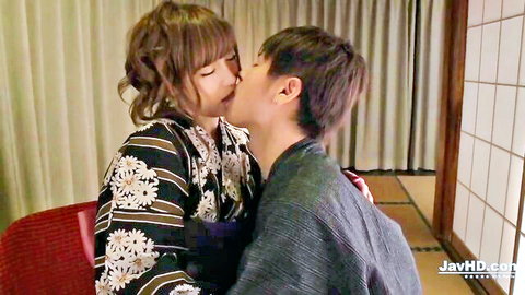 Hot Japanese MILF in kimono shares passionate kiss with her man