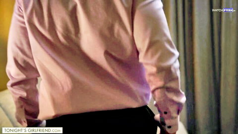 Lauren Phillips naughty nurse in pink scrubs showcasing curvy backside
