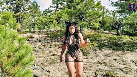 Yiny Leon as horny forest witch in sexy black lingerie outdoors
