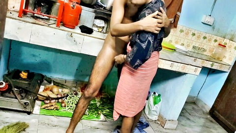 Desi babe in pink skirt hugged from behind by nude young Indian hunk
