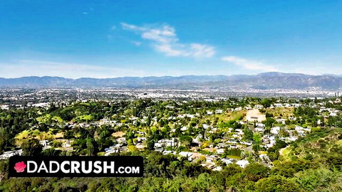 Nicole Luva outdoor LA skyline view in Dad Crush scene