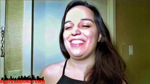 Mia winking smile in black tank top for cuckold threesome video