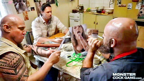 Bald men laugh at photo of blonde slut's mouth stretched on monster cock in kitchen