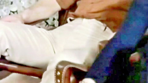 Skinny babe with tiny tits groped roughly by two men in white lingerie on couch