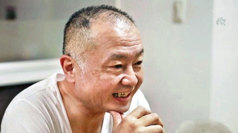 Older Japanese man smiling in white t-shirt, JAV stepmom video thumbnail