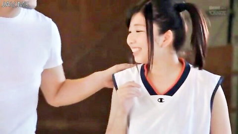 Cute smiling Asian student in tight Champion basketball jersey hugged from behind by boyfriend