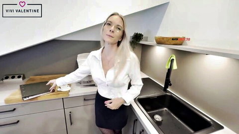Blonde Vivi Vallentine in white blouse and skirt teasing seductively